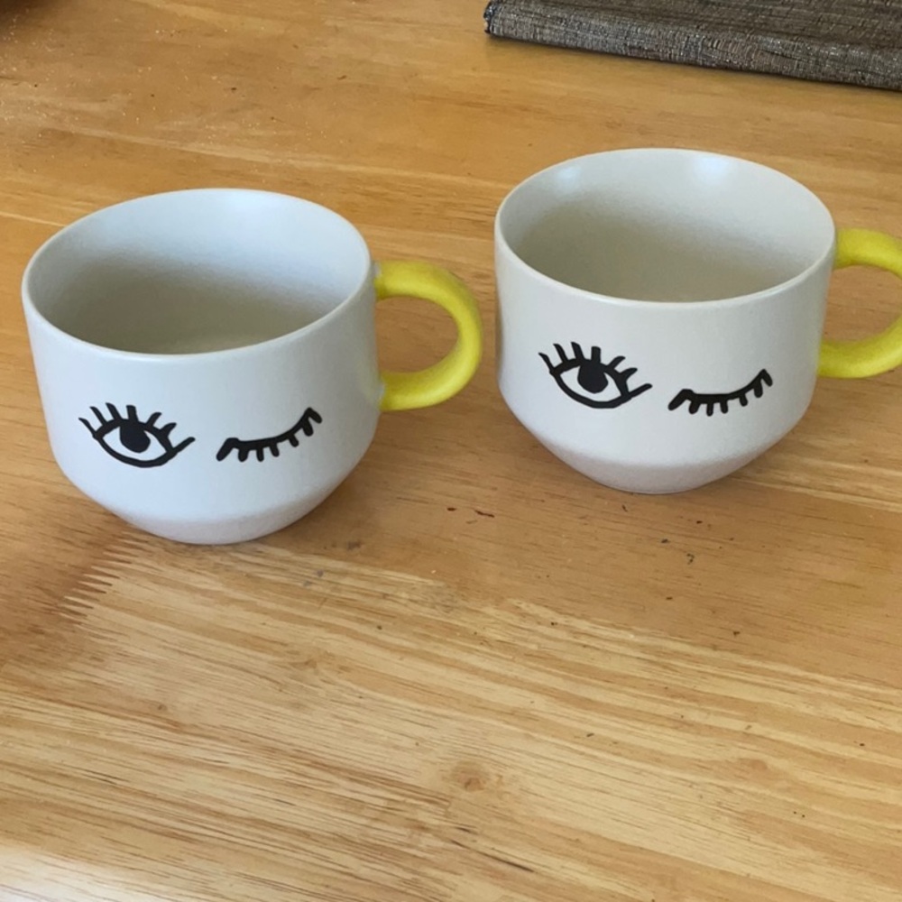 Starbucks White Ceramic Winking Eye Mugs with Yellow Handles (Set of 2)